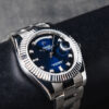 Rolex Day-Date 40mm Aço Mostrador Azul Luneta Canelada Pulseira Oyster
